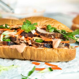 Teriyaki Pork Bahn Mi Sandwich has sliced, glazed pork tenderloin layered with pickled vegetables and herbs for a perfect lunch, party or Game Day favorite. keviniscooking.com