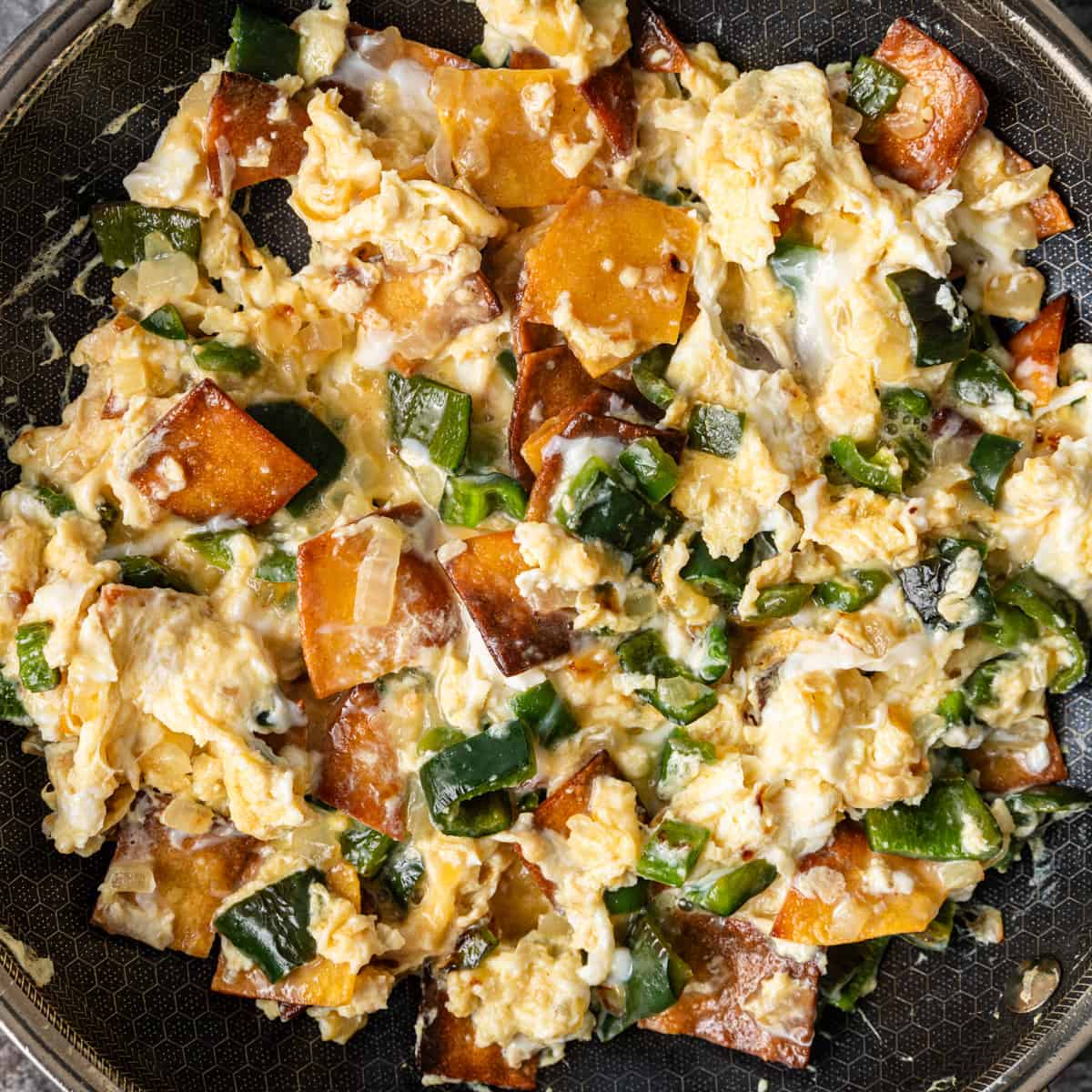 overhead: cooking Tex Mex migas in a skillet