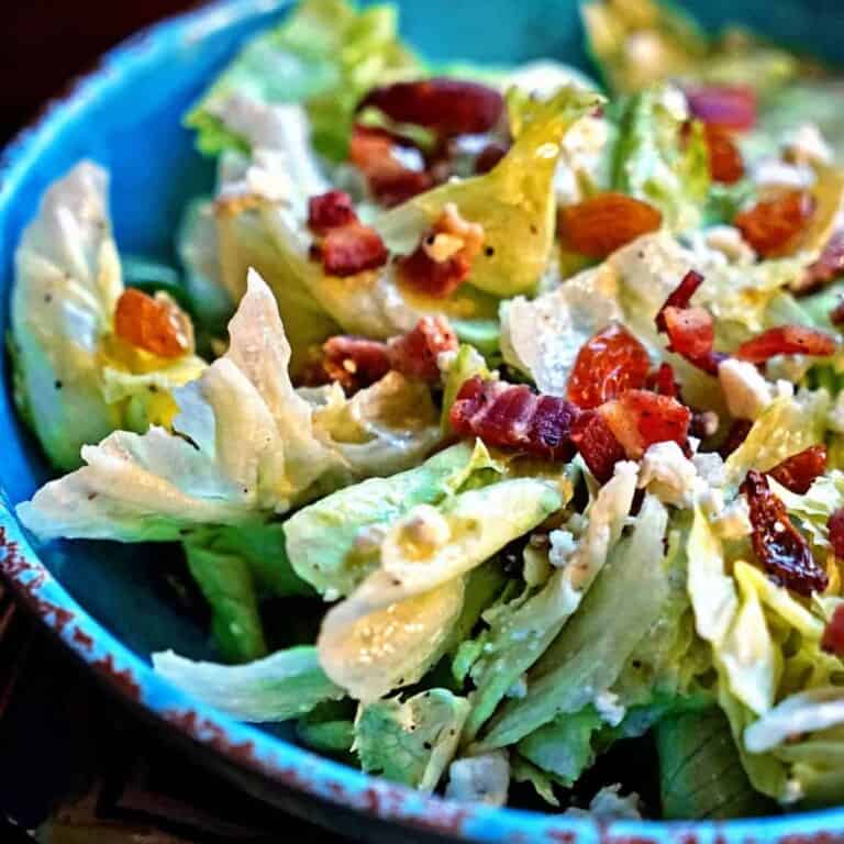 thunderbird salad in blue bowl with bacon