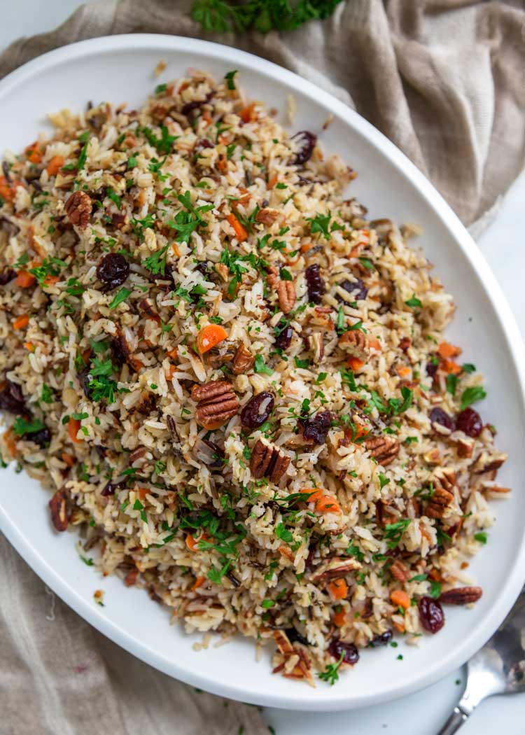 Thanksgiving rice side dish on white platter